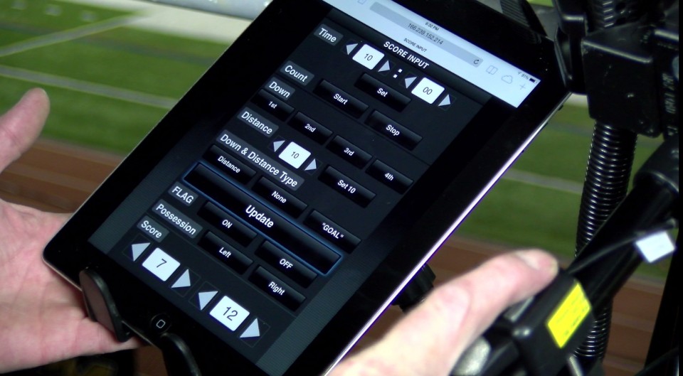  A touchscreen interface for a new JVC camera allows a camera operator to directly input scoring information into the camera signal prior to its being streamed out to viewers.