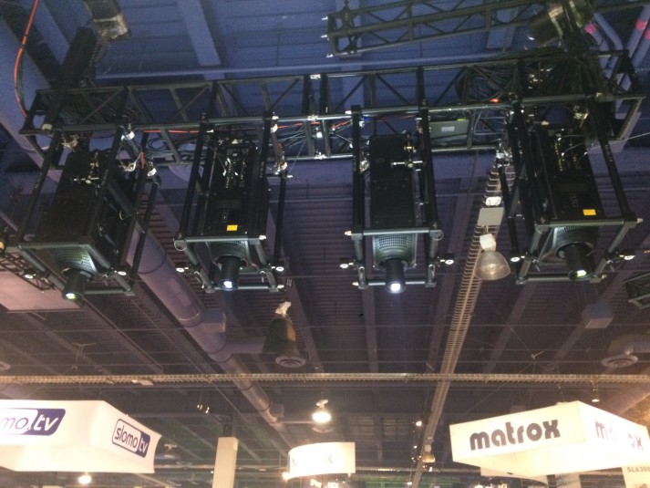 Four Boxer 2K30 projectors were installed above the booth for the mapping demo.