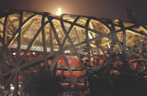 The Olympic Flame, visible over the iconic Bird's Nest, at the 2008 Beijing Olympics