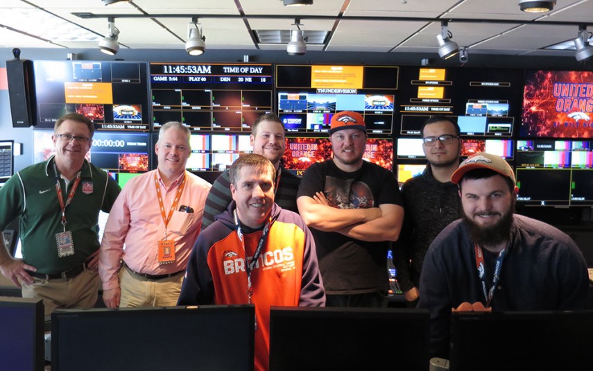 The Denver Broncos video staff inside the control room at Sports Authority Field at Mile High: (from left) Pat Jordan, Mike Bonner, Spencer Millard, Nick Young (front), Jeremy Wecker, Luis Miranda, and Aaron Gunning (front)