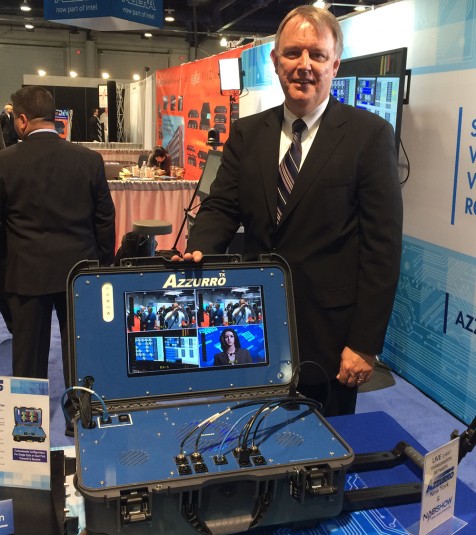 EVP of Sales Mark Lowden shows off the Azzurro TX portable transmission system in the company’s booth.