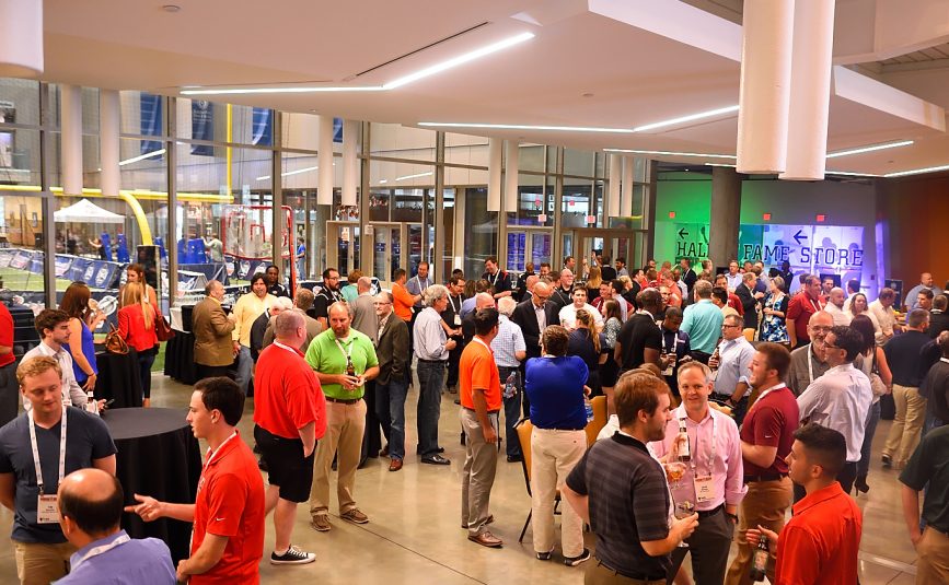 Attendees gathered at the Opening Night Reception at the College Football Hall of Fame.