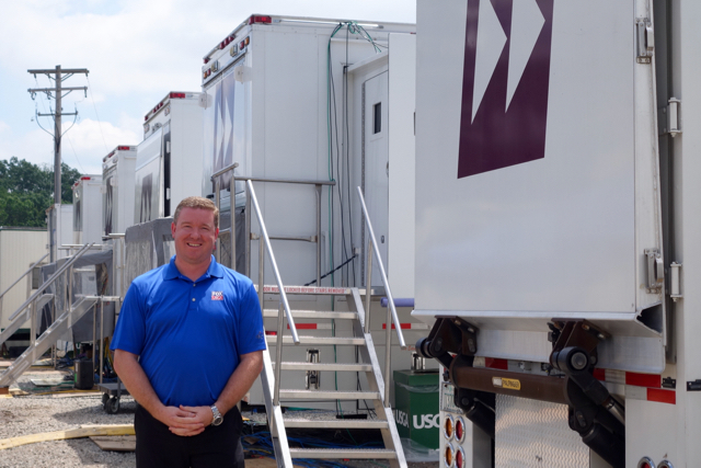 Brad Cheney of Fox Sports outside the Game Creek Encore production unit, which is at the center of U.S. Open golf coverage