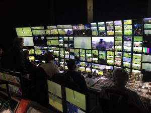 Working in a large cabin gives the NBC Sports production team plenty of space for a large monitor wall.