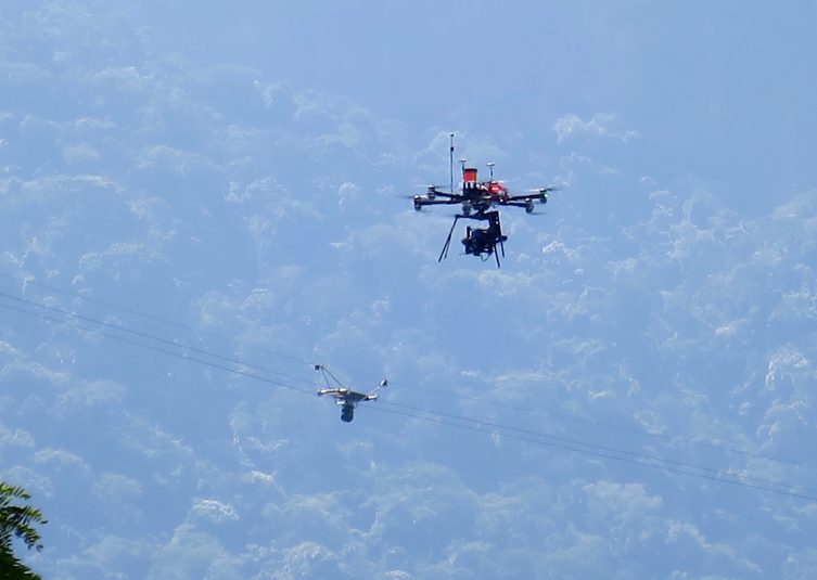 The rowing events at the Olympics have two forms of aerial coverage: a Camcat cable cam and a drone.