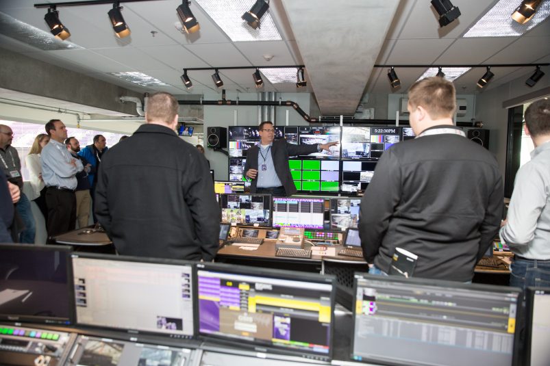 Alpha Video’s Brian Beckwith, broadcast design engineer, explains the inner workings of the U.S. Bank Stadium video-control room to event attendees.